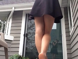 Upskirt milf pees standing on porch