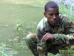 Cock-strong twink soldier by the river